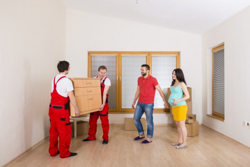 Office equipment and furniture being prepared for relocation