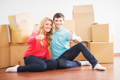 Packed moving boxes and furniture ready for transport in Paddington